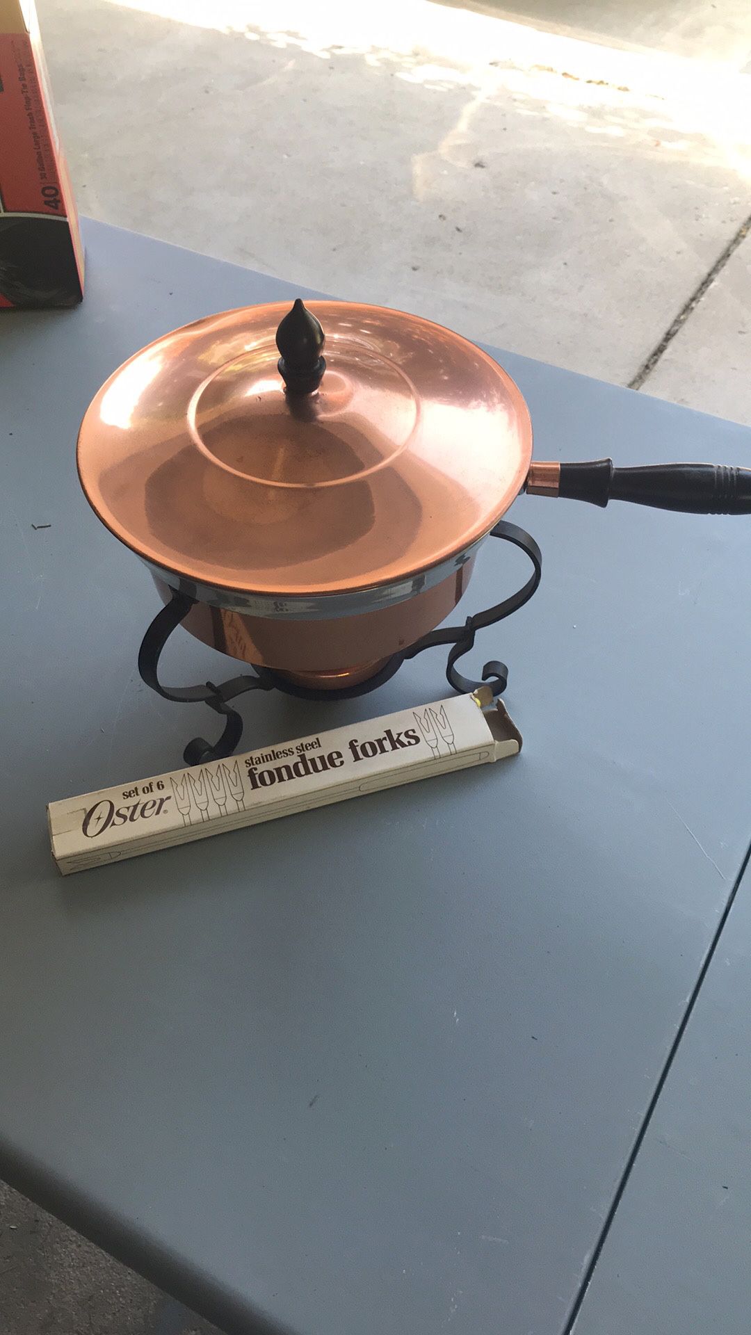 Antique copper fondue pot with stainless steel