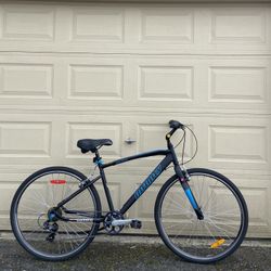 Infinity Boss Three 7-Speed Hybrid Bike – 700c Wheels, Matte Black Bicycle