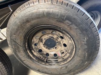 1 trailer tire with rim only 1 left  235x85-16 14 ply $200 Only 1 left