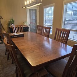 Solid Oak Dining Room Table, 8 Chairs And Hutch 