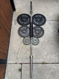 Olympic weights with Olympic bar solid workout weights