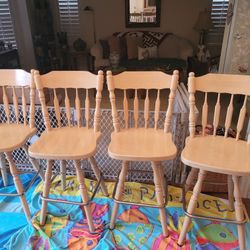 Counter height wood swivel chairs, set of 4