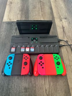 Nintendo Switch + Controllers + Games + Charging Base bundle
