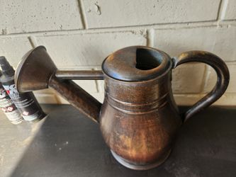 vintage watering copper can