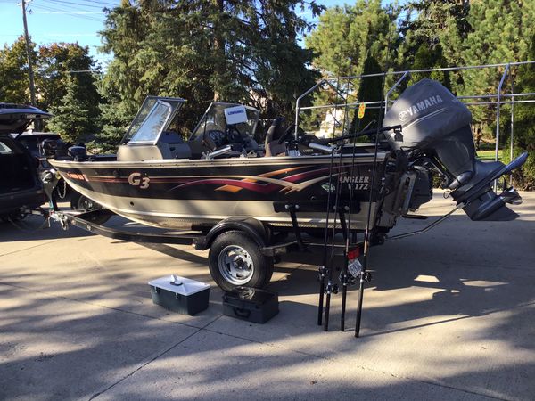 2008 angler v172 g3 boat with 2 tackle boxes and 4 fishing rods