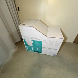 New WaterRidge One-piece Elongated Toilet. Still in the box. See pictures and video