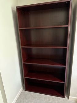 Red wooden bookshelf