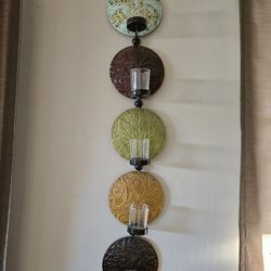 Tuscan-style metal wall candle holder