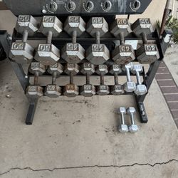 Dumbbells weights 10-50lbs plus rack 490lbs total