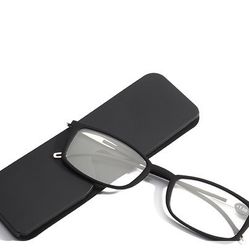Black folding reading glasses attachable to rear of cell phone
