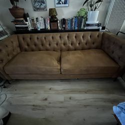 Couch with Spring Missing. 