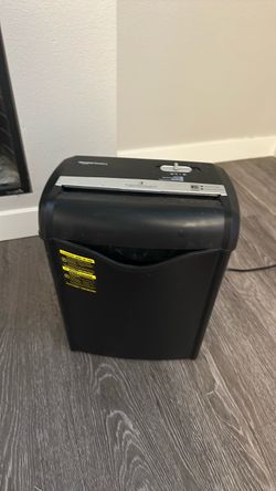 Small Amazon Basics paper shredder