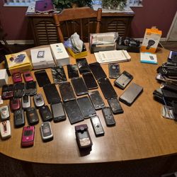 Lot Of Cell Phones And Cases And Accessories