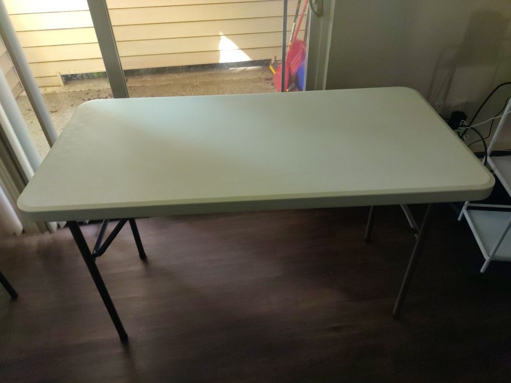 Folding Tables And 1 Chair