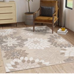 8/10 Beige Outdoor Indoor Floral Rug 