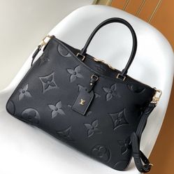 Louis Vuitton black monogram embossed leather bag