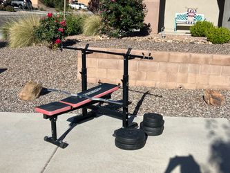 Gym set and 100 pound weights