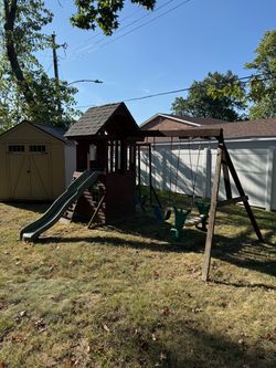 Wooden Swing Set with Slide and Playhouse $50 OBO