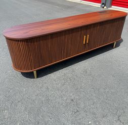 Walnut 71” tv stand with adjustable shelves and electric panel on top