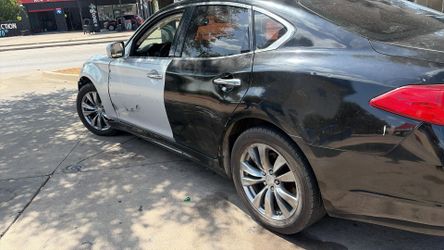 Infiniti Sedan with Body Damage