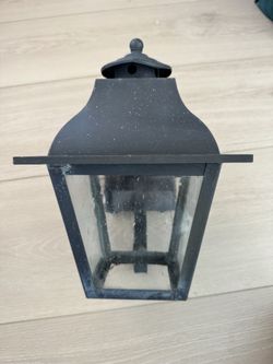 Free black outdoor wall lantern.
