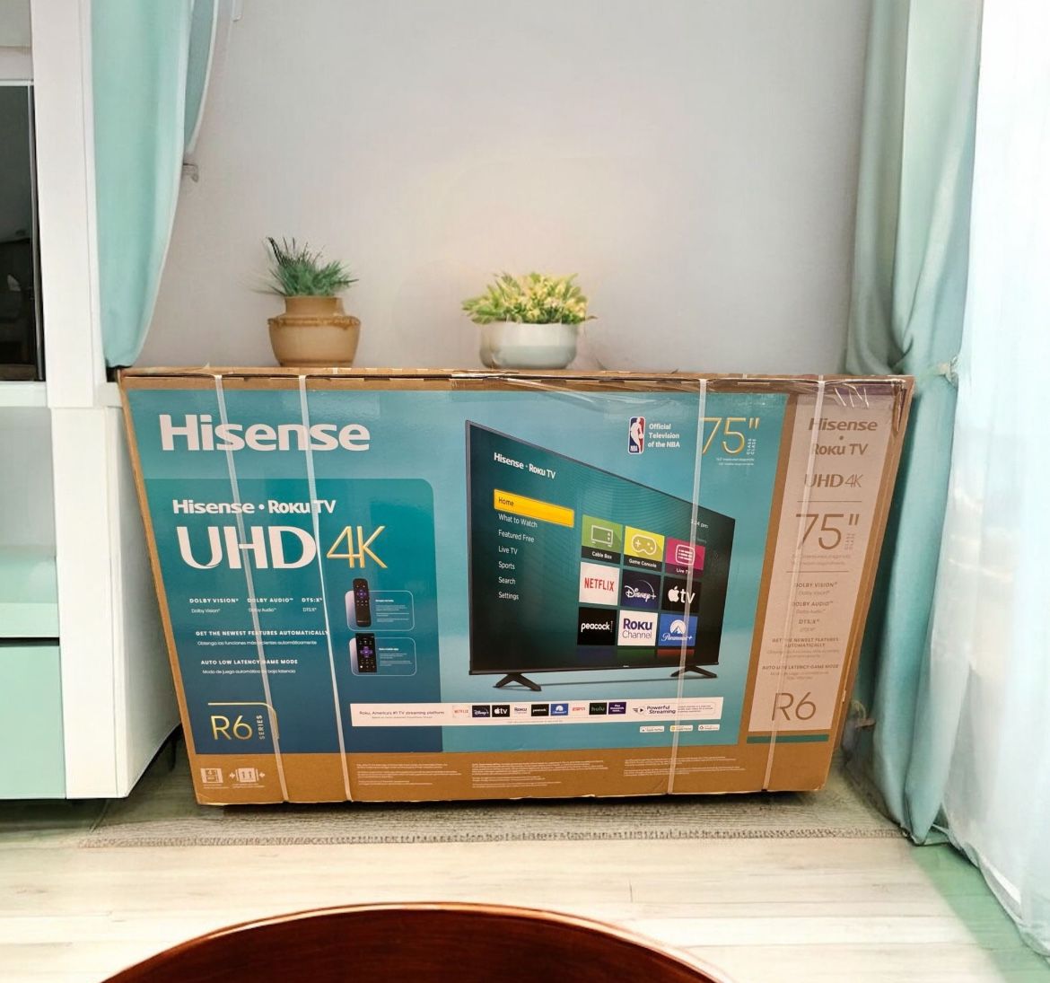 HD293 75” Hisense smart 4k Roku led tv floor model