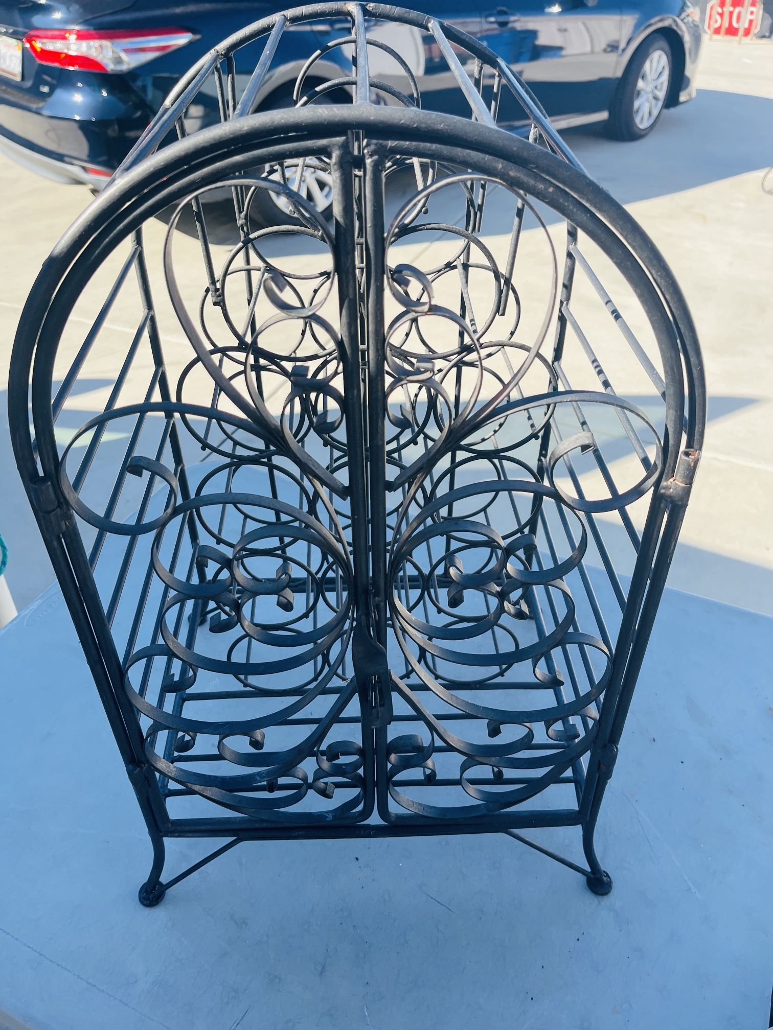 Cast Iron 15 Bottle Wine Rack With Doors And Locking Bar To Keep Your Fine Wines Intact.