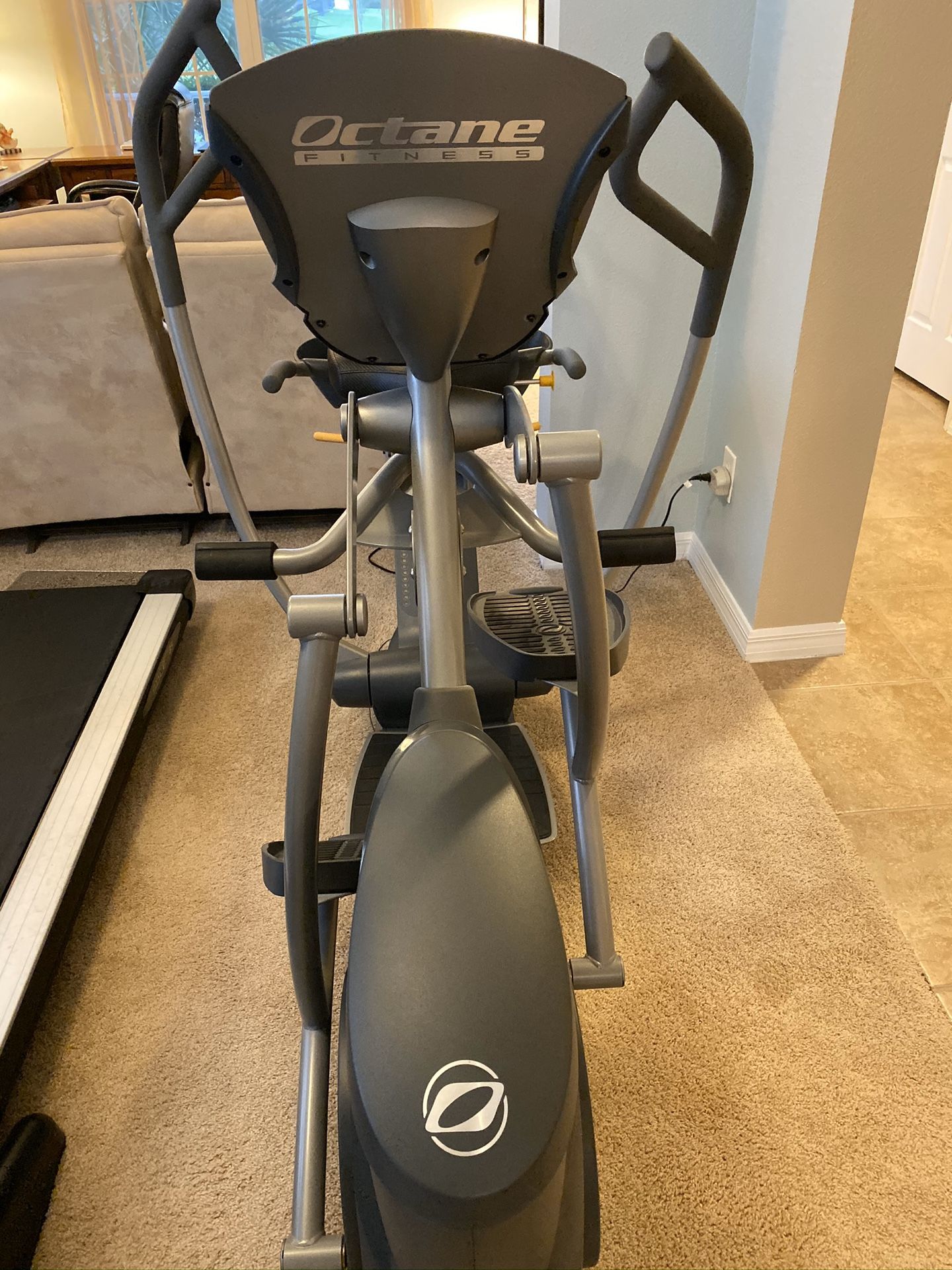 Octane Fitness elliptical (Gym Quality recumbent elliptical).