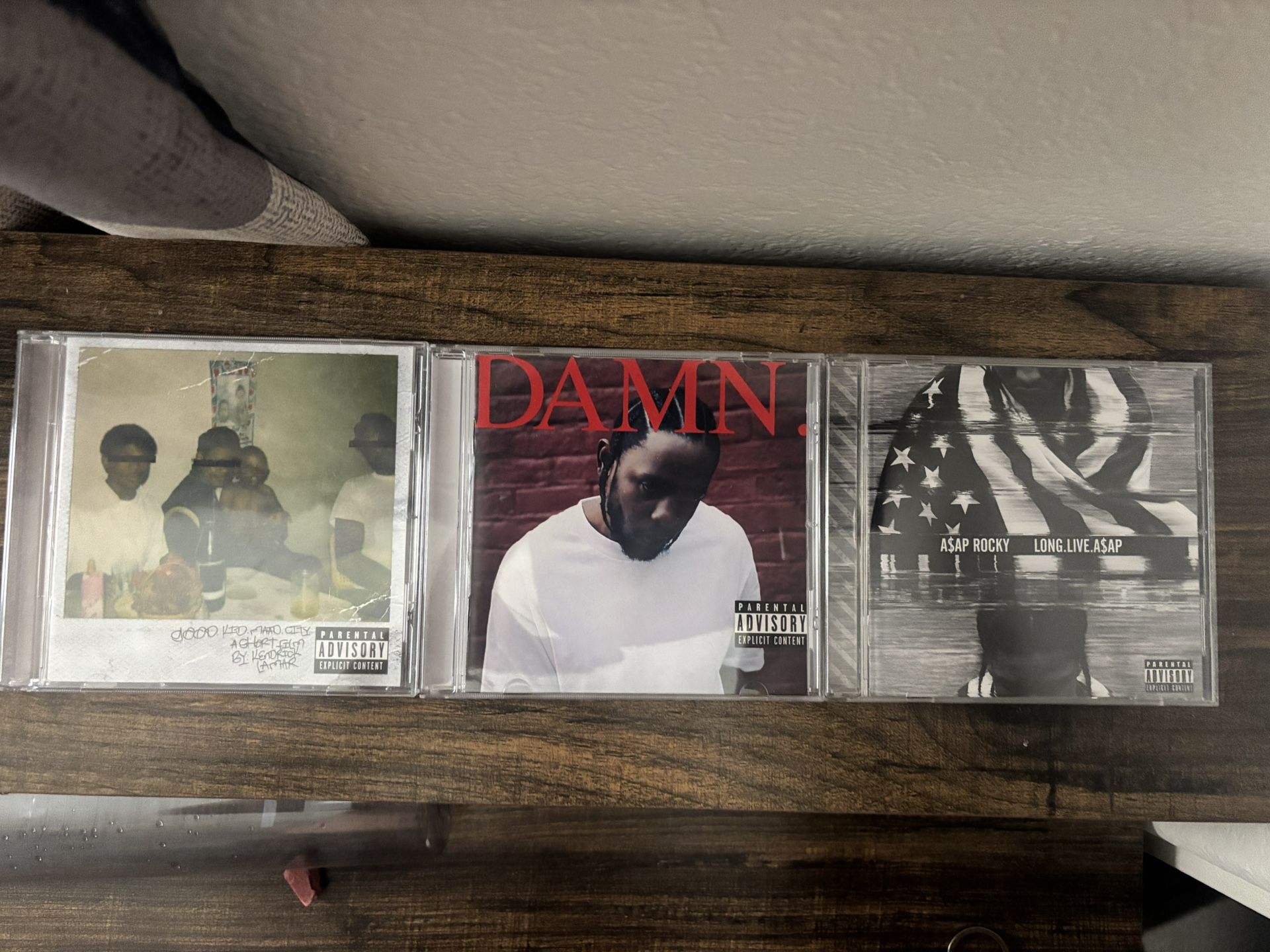 Kendrick Lamar and Asap Rocky CDs