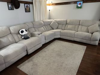 Everest 7 piece sectional and 3 pillows $1200