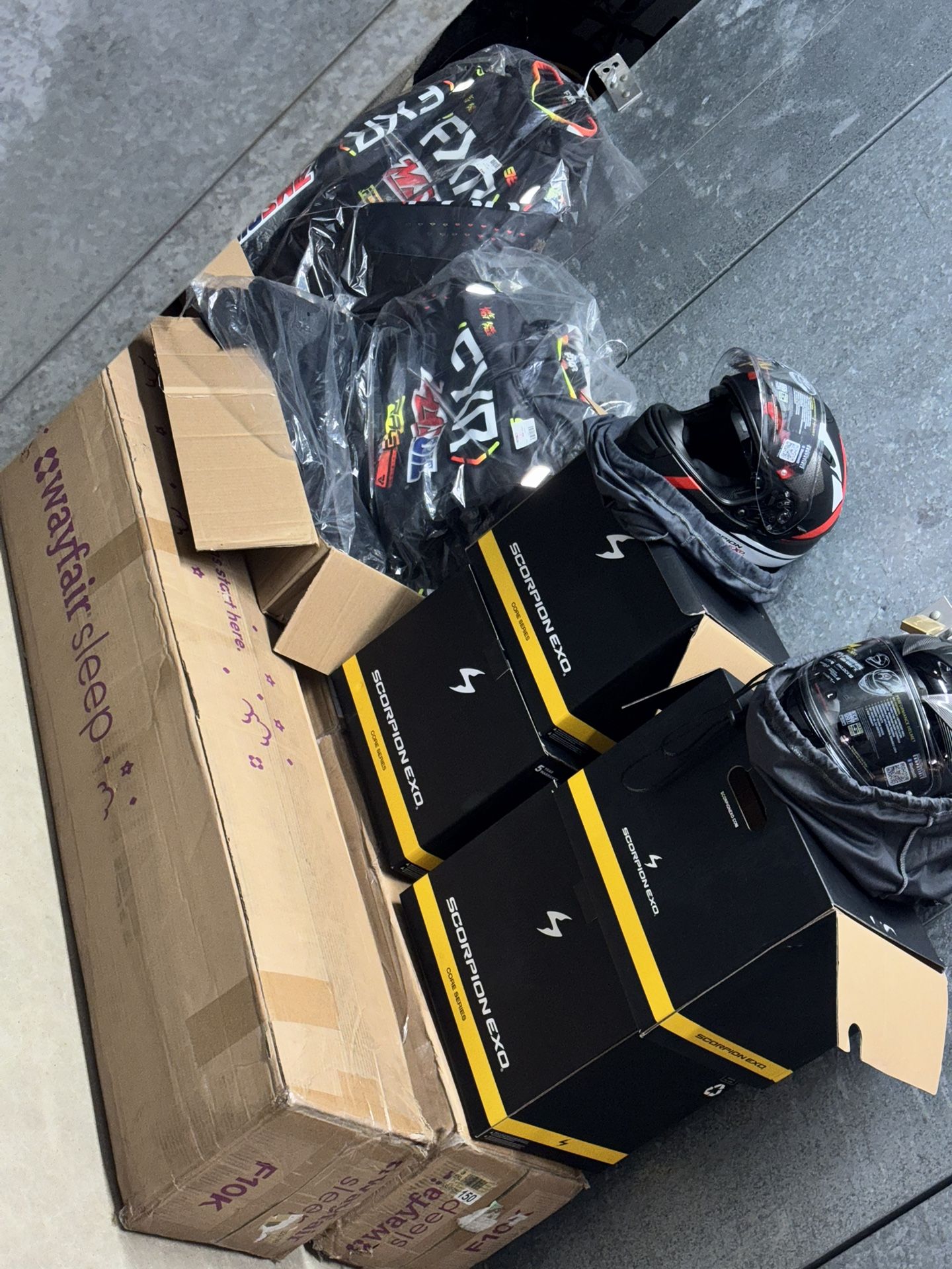 Motorcycle Helmet two Small red 2 Black L & two JACKET One Medium One Large $100 for each one of them everything you see is brand new never been used