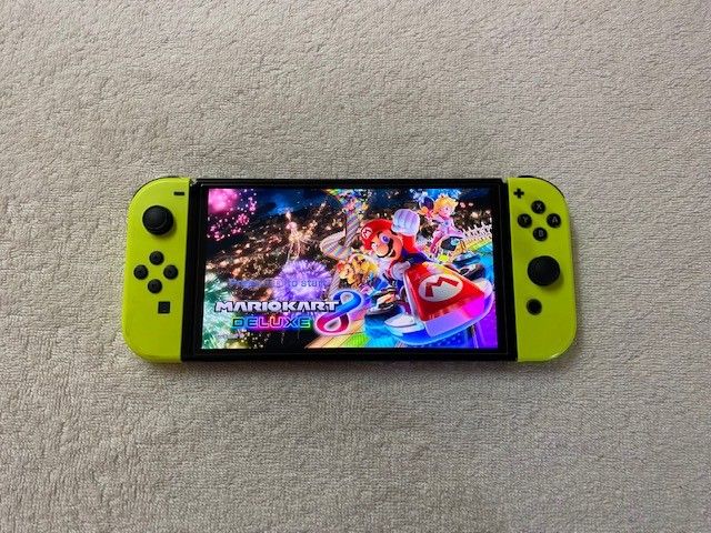 Switch OLED With 125 Popular Switch Games