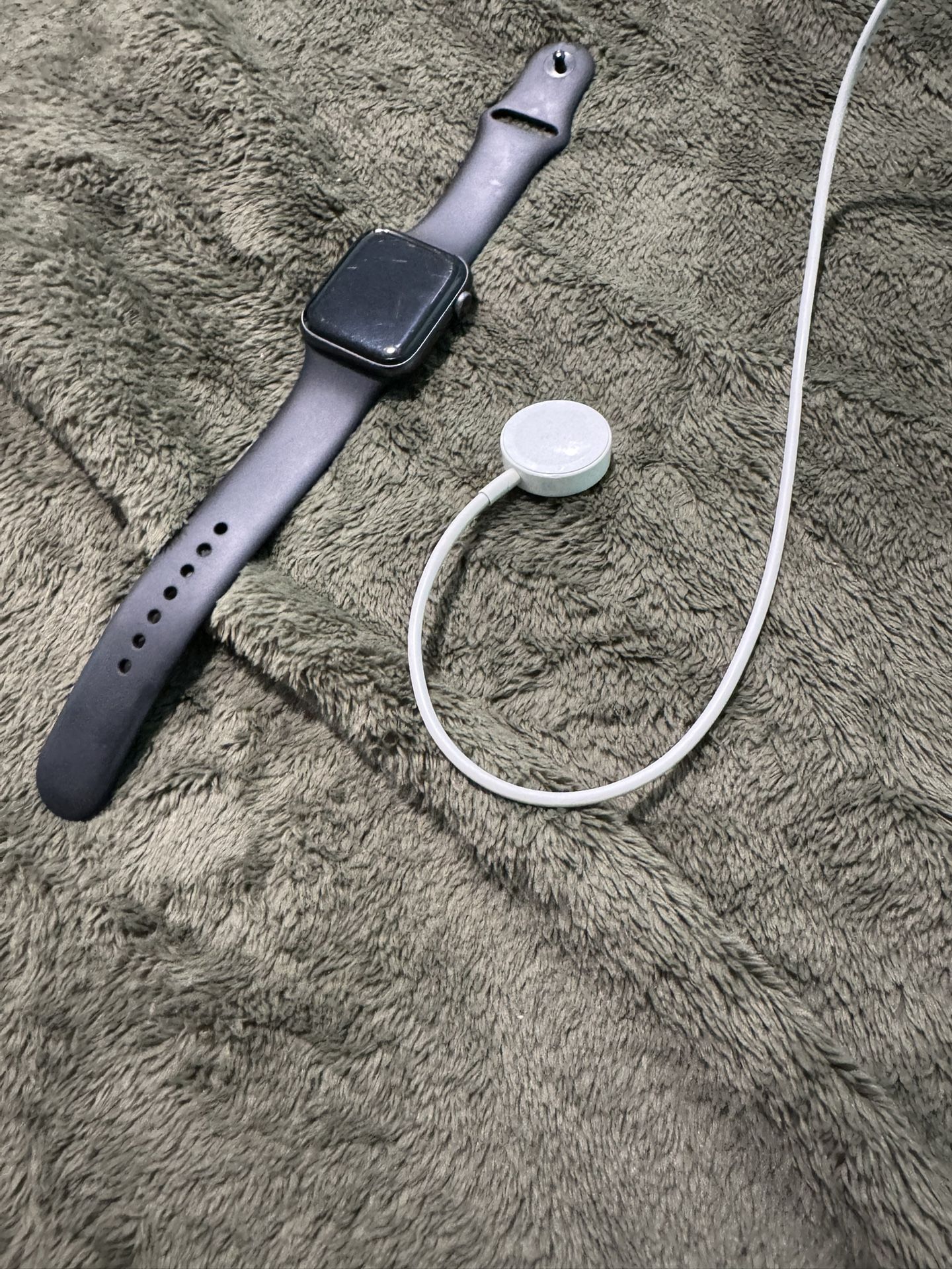 Apple Watch Series 7, Comes With The Charger, Has Some Scratches In The Screen But Works Great