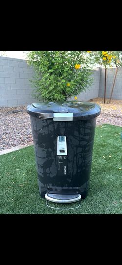 Fairly new garbage can just used in backyard rarely