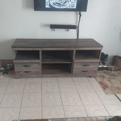 Signature Design by Ashley Trinell 63 Inch TV Stand

