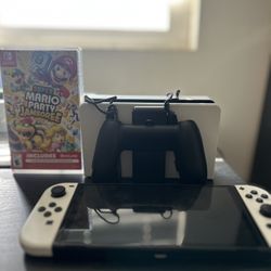 Nintendo switch Oled barley used with new mario party and mario kart.