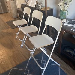3 white IKEA barstools