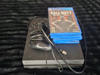 Playstation 4 1TB bundle - controller plus 4 games