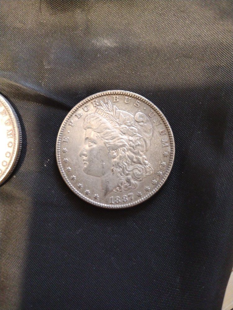 Silver Dollar Morgan's 1887 and 1884