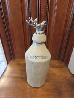 W. Brown 1873 Stoneware Beer bottle with stag head stopper