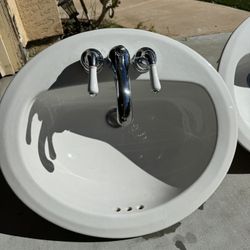 Two White oval sink (20”(16”)x17” x 7”deep) with chrome faucet $65 each