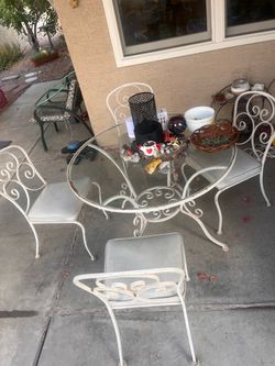 Vintage outdoor glass table and 4 matching chairs