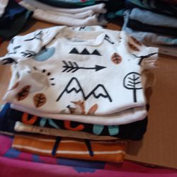 Selling baby boy clothing and newborn baby boy shoes.