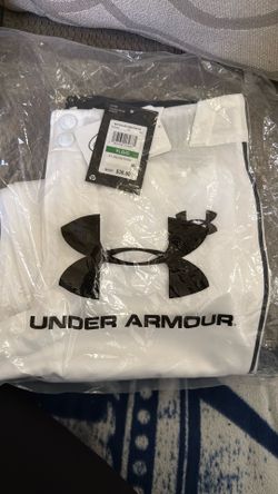 Under Armour youth, large pants black pants strip