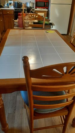 Country style tile top kitchen table and 4 chairs