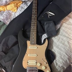 Fender starcaster electric guitar with Amp And cables