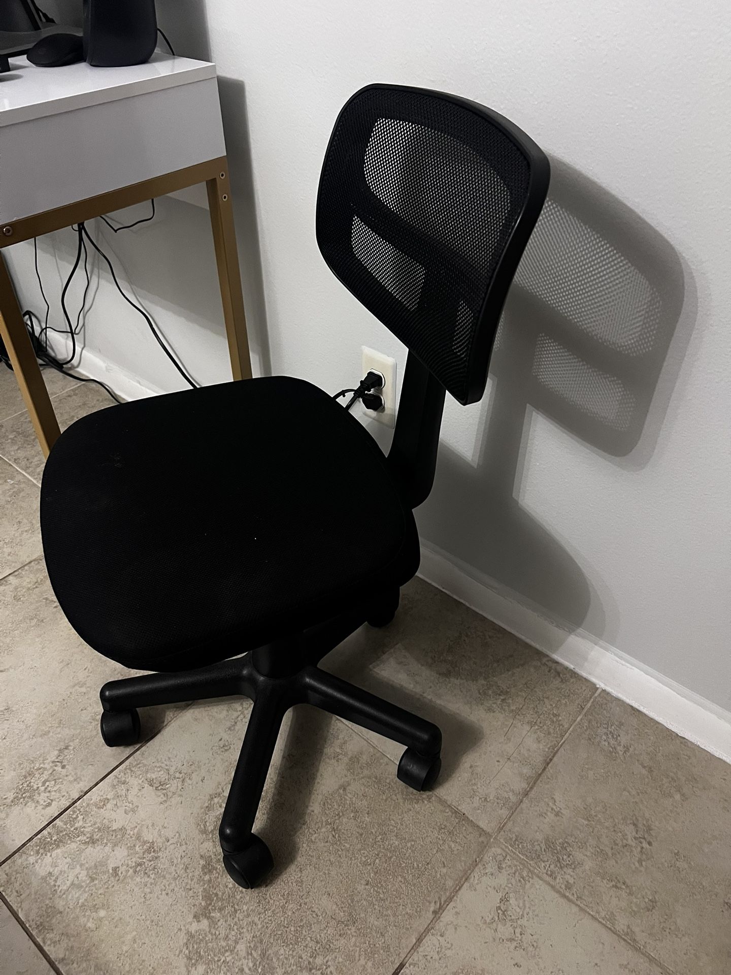 Chair, and eyelash accessories.