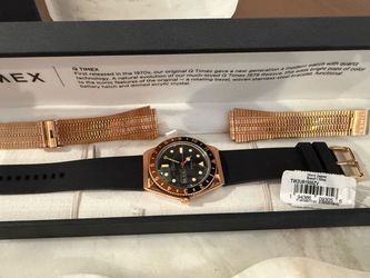 Brand new unworn Timex Q Rootbeer Rosegold with extra rubber strap.  Unworn bracelet.   Rare.  Discontinued.