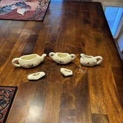 Vintage miniature tea, sugar, and creamer set. 