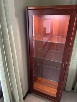 Modern media cabinet and curio(tall display cabinet) from Dania Furniture